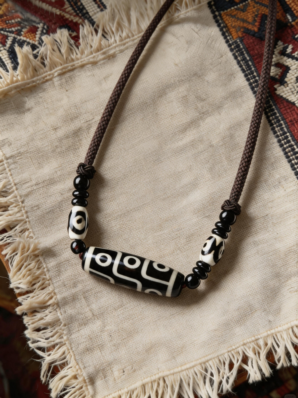 Nine-Eyed Dzi Braided Cord Bracelet