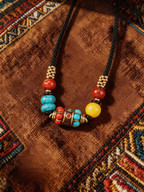 Fine Cord Bracelet with Brass Detail